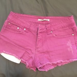 Pink cutoff shorts